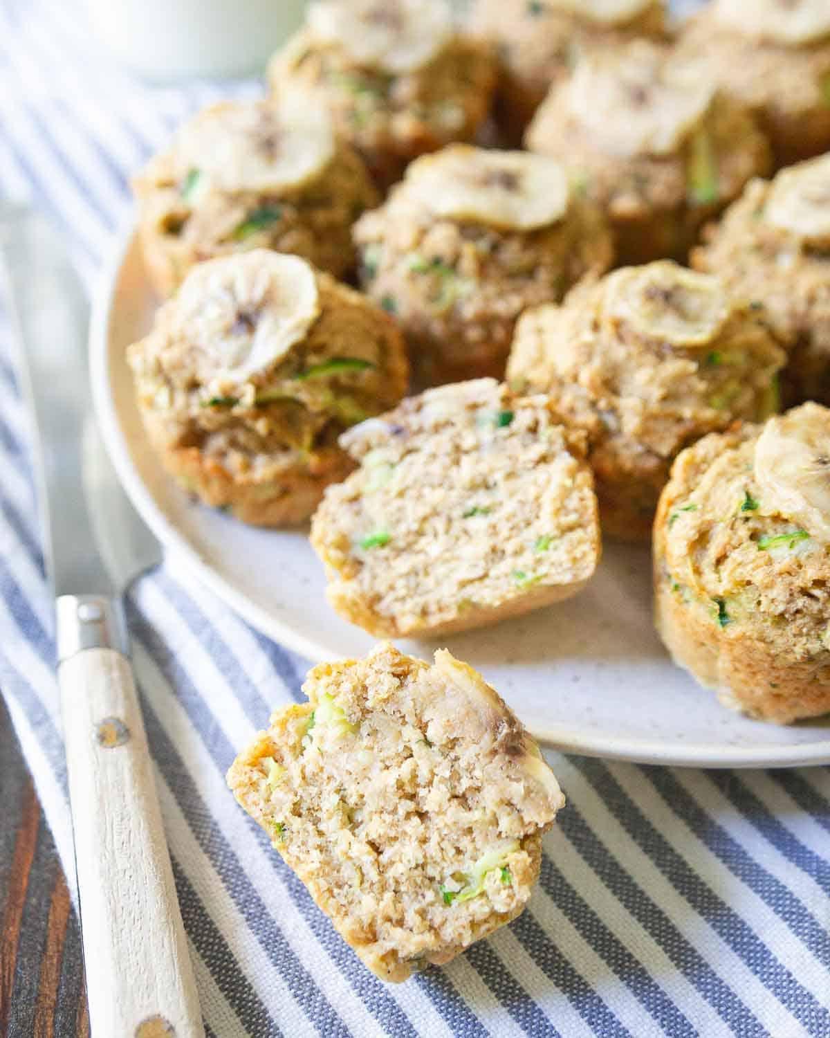 These zucchini banana mini-muffins are naturally sweetened, super moist and the perfect bite-sized snack. These zucchini banana mini-muffins are naturally sweetened, super moist and the perfect bite-sized snack.