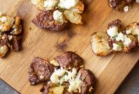 Crispy Smashed Potatoes with Aromatic Herbs and Tangy Blue Cheese