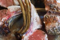 Tender Herb Crusted Lamb Rack with Robust Red Wine Sauce