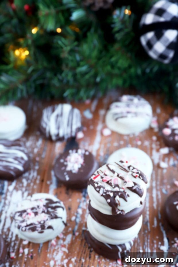 Effortless Chocolate Oreo Treats 4 Christmas decorated oreos image, featuring a trio of beautifully adorned chocolate-dipped Oreos.