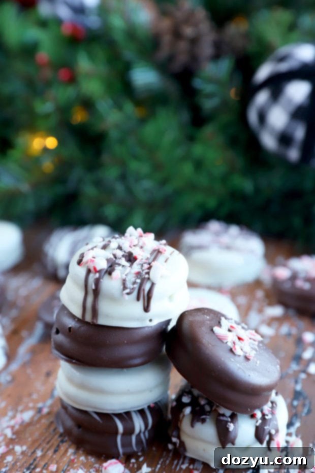 Effortless Chocolate Oreo Treats 6 Stack of decorated oreos image, showing a creative assortment of chocolate-dipped and sprinkled cookies.