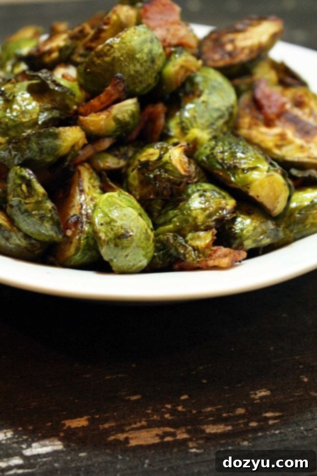 Tangy Balsamic & Crispy Bacon Brussels Sprouts 2 Roasted Balsamic Brussels Sprouts with Bacon in a serving bowl