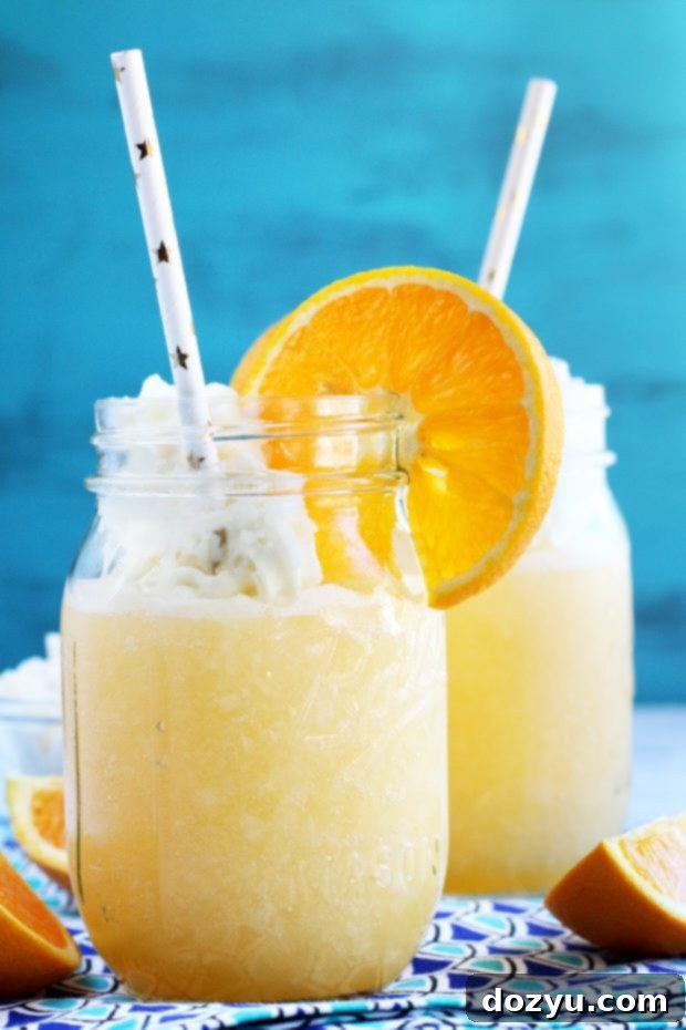 Creamy Orange Bliss 2 Picture of orange cocktail in two mason jars