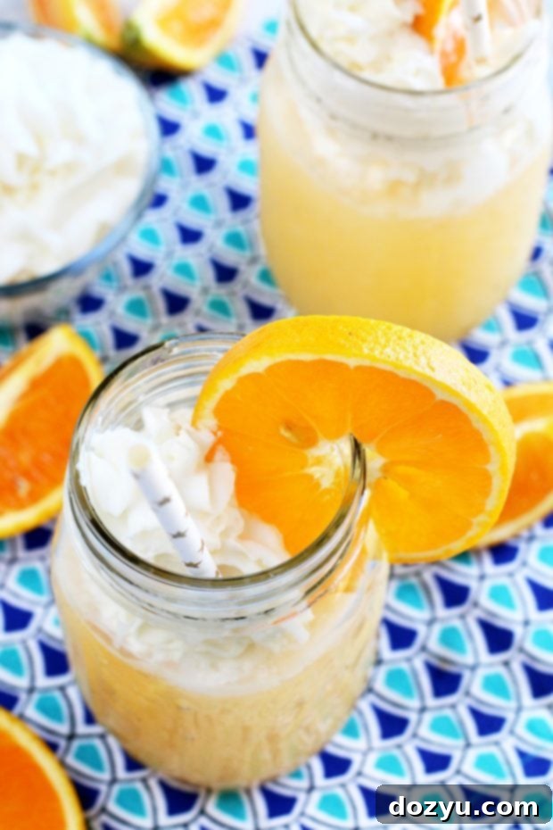 Creamy Orange Bliss 3 Orange Dreamsicle Cocktail in mason jars image
