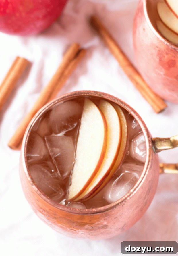 Autumn Orchard Mule 3 Cider Mule cocktail being poured | cakenknife.com