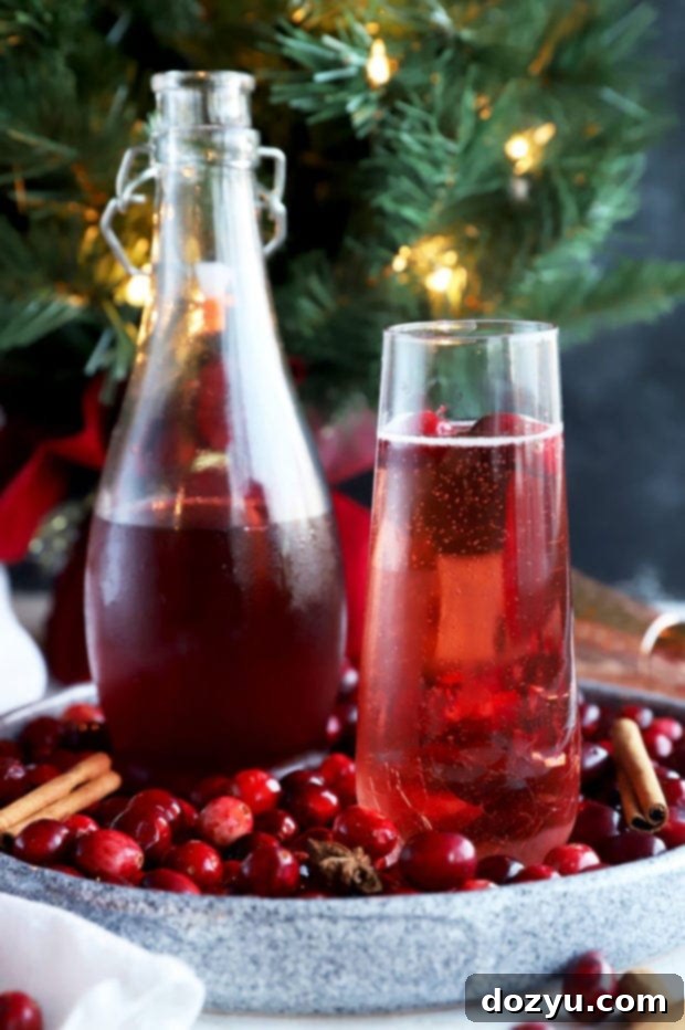 Side photo of cranberry spice sparkler in a champagne flute