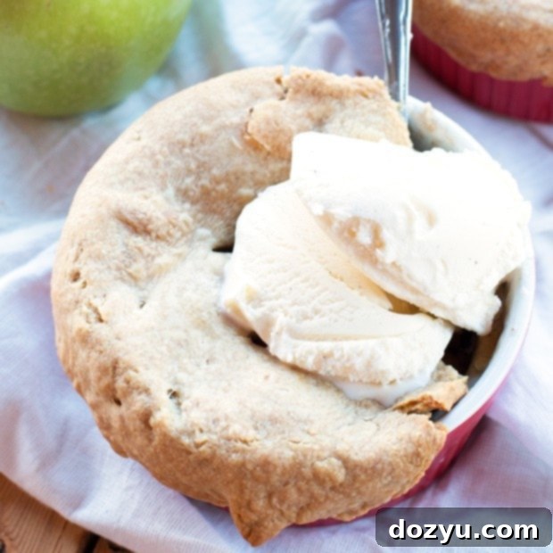 Close-up of a freshly baked Easy Individual Bourbon Apple Pie thumbnail