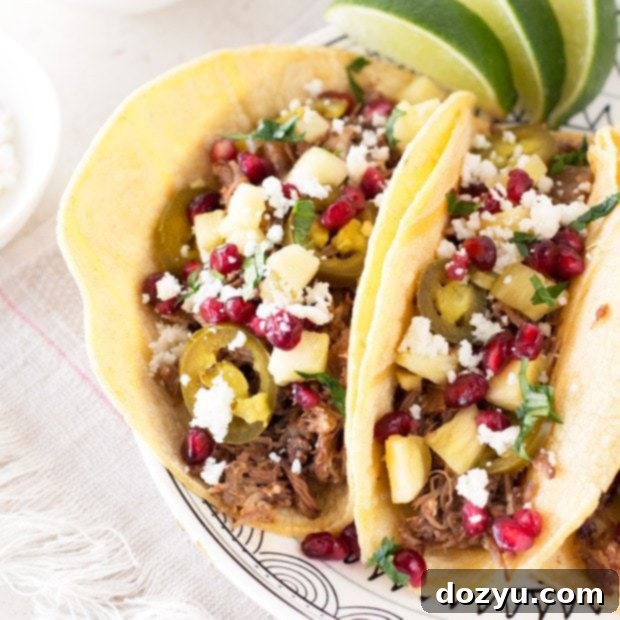 Pomegranate Glazed Pulled Pork Tacos 5 Pomegranate Pulled Pork Tacos: A festive and easy holiday recipe.