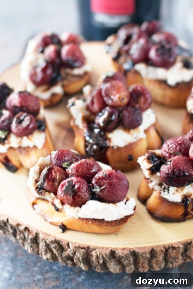 Roasted Grape & Balsamic Crostini on a wooden board
