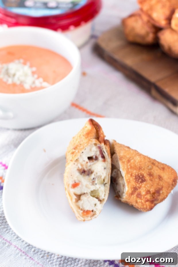 Cheesy Bacon Ranch Chicken Egg Rolls with Creamy Buffalo Dipping Sauce | cakenknife.com