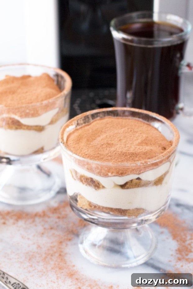 Delicious Individual Tiramisu Parfaits layered with mascarpone cream and espresso-soaked ladyfingers