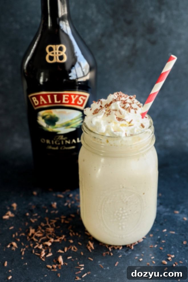 Baileys Coffee Cloud 4 baileys coffee milkshake with baileys bottle in the background