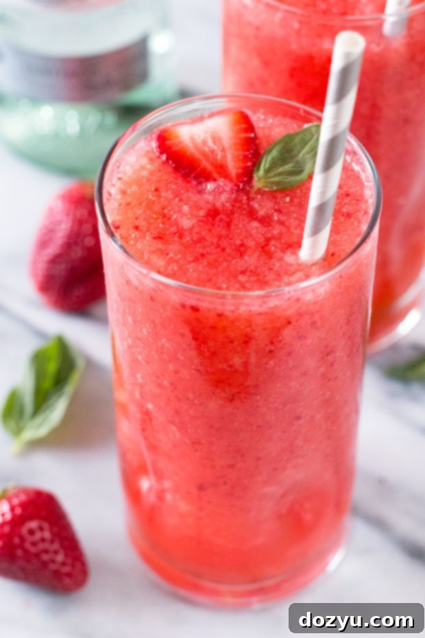 Strawberry Basil Frozen Daiquiri with red hair and red car in background, symbolizing vibrant red theme