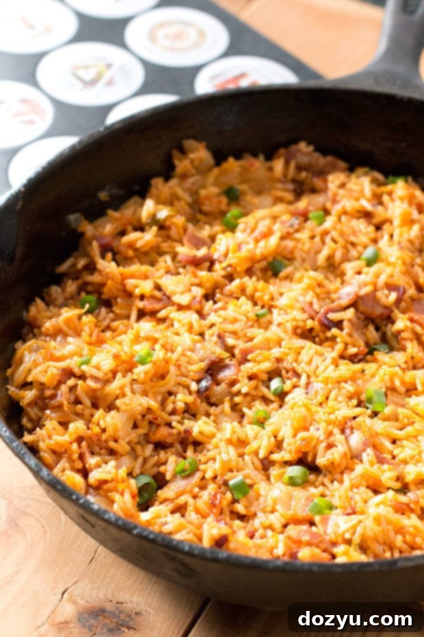 Close-up of Kimchi Fried Rice with vibrant colors and textures.
