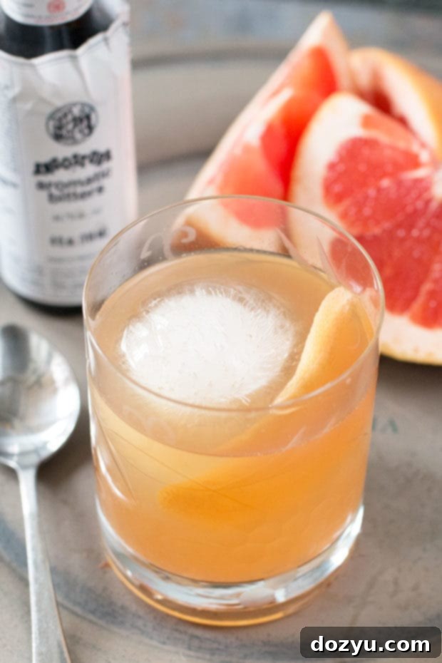 Ingredients for a Sparkling Grapefruit Old Fashioned cocktail, ready to mix.