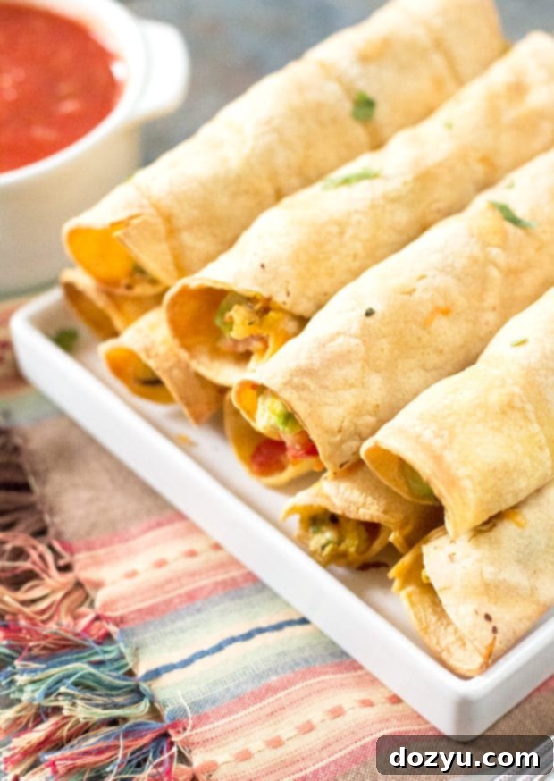 Freshly baked Breakfast Taquitos with a golden brown finish, ready to be served