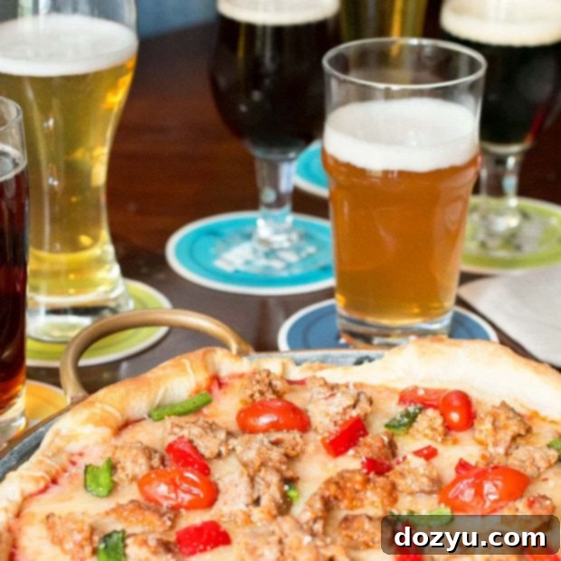Pints and Pies Bash 9 A delicious slice of pizza next to a glass of craft beer, perfect for a beer tasting pizza party.