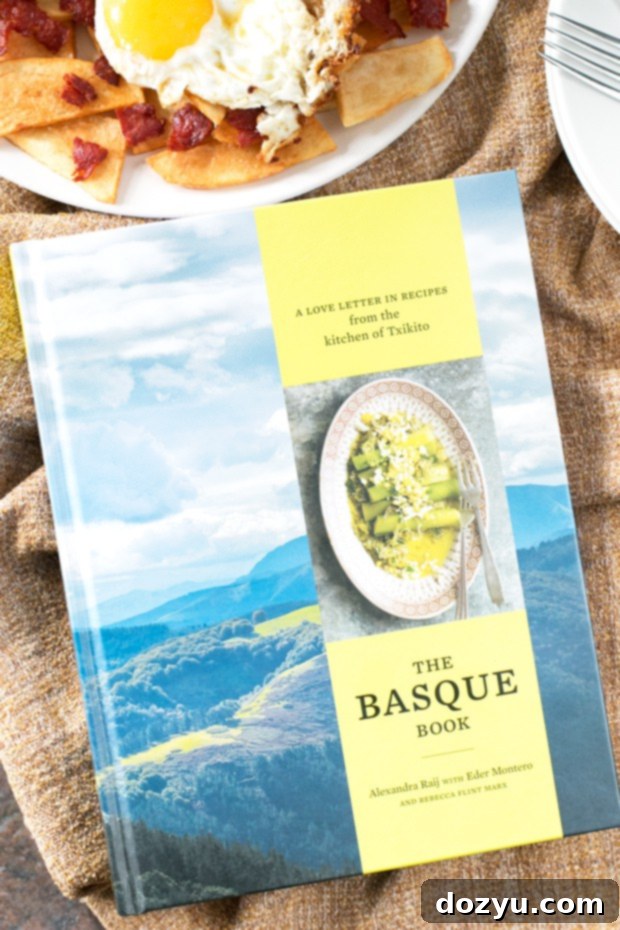The Basque Book Unveiled Messy Eggs and Rough Cut Potatoes 3 Close-up of 'The Basque Book' cookbook cover, showing a rustic and inviting culinary scene, alongside a delicious plate of Messy Eggs and Rough-Cut Potatoes.