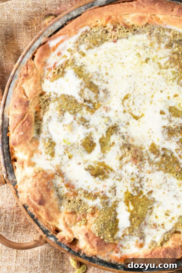 Gourmet Pistachio Pesto Pizza topped with Crème Fraîche and Roasted Garlic