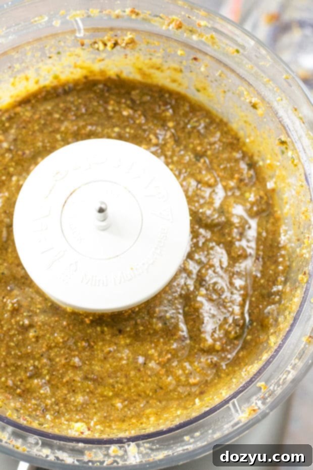 KitchenAid Food Processor creating fresh pistachio pesto for pizza