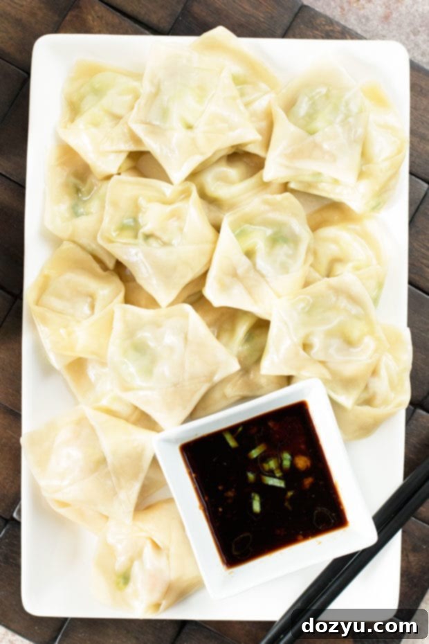 Delicious Steamed Shrimp Avocado Wontons with a side of Ginger Dipping Sauce