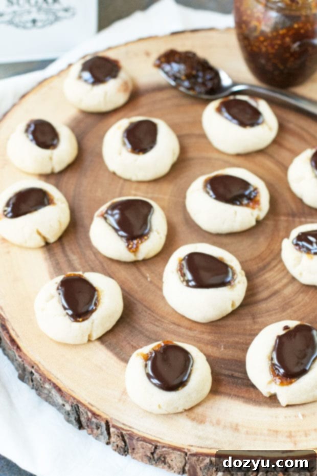 Decadent Chocolate Fig Thumbprints 3 Close-up of Chocolate Fig Thumbprint Cookies, showcasing the rich filling | cakenknife.com