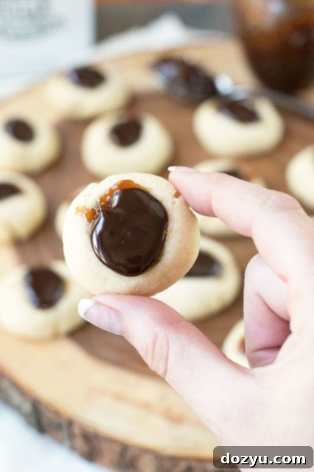 Decadent Chocolate Fig Thumbprints 4 Freshly baked Chocolate Fig Thumbprint Cookies cooling | cakenknife.com