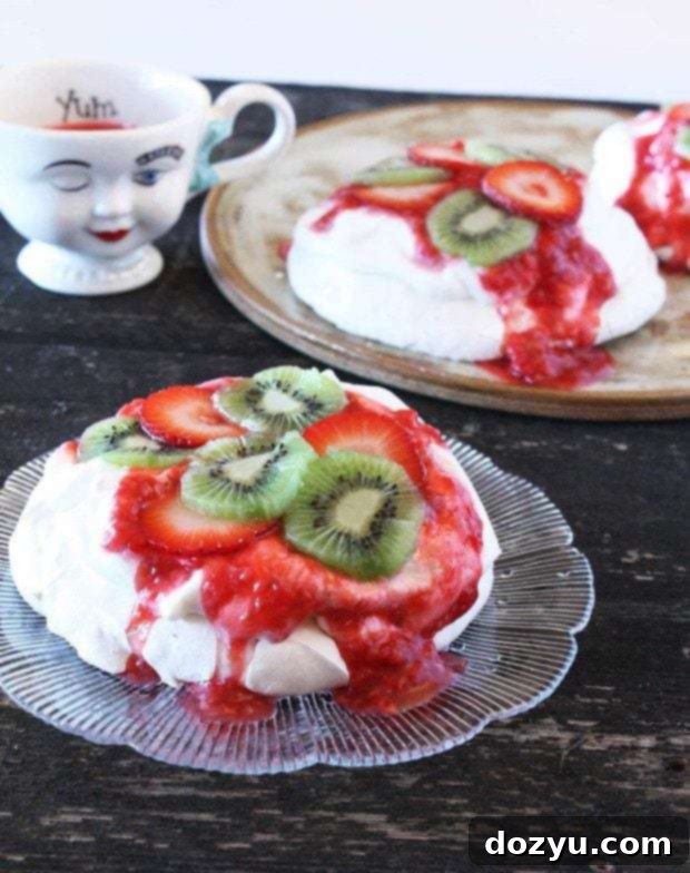 Personal Pavlova Perfection 2 Recipe image for individual pavlovas topped with berries and kiwi