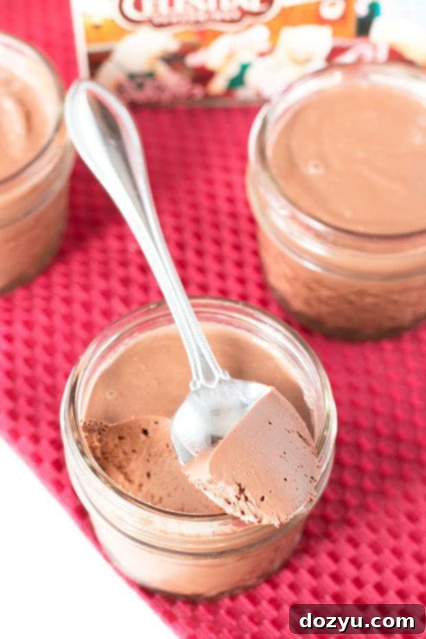 Chocolate Peppermint Pots de Creme served in mini mason jars, perfect for holiday parties | cakenknife.com