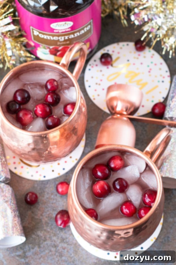 Cranberry Pomegranate Champagne Mule | cakenknife.com