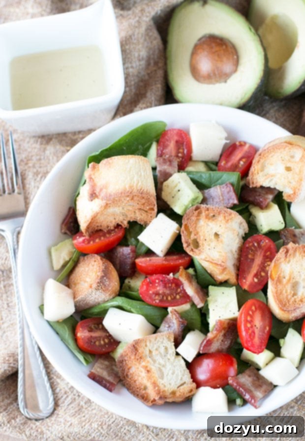 Avocado Caprese Panzanella Salad ready to be served