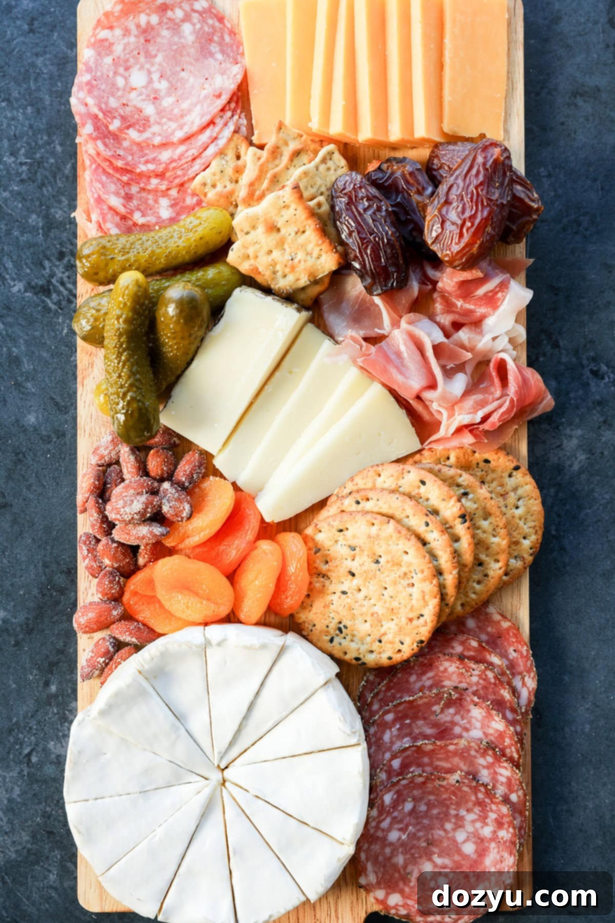 easy charcuterie board with a selection of cheeses, meats, and accompaniments