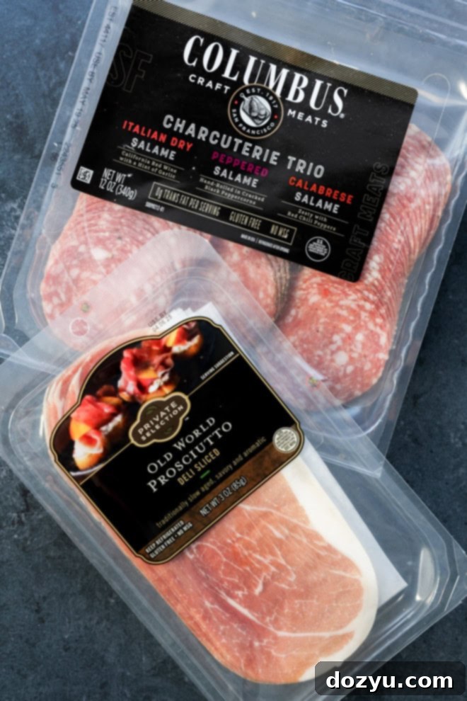 packaged prosciutto and a variety of salami slices, ready for a charcuterie board