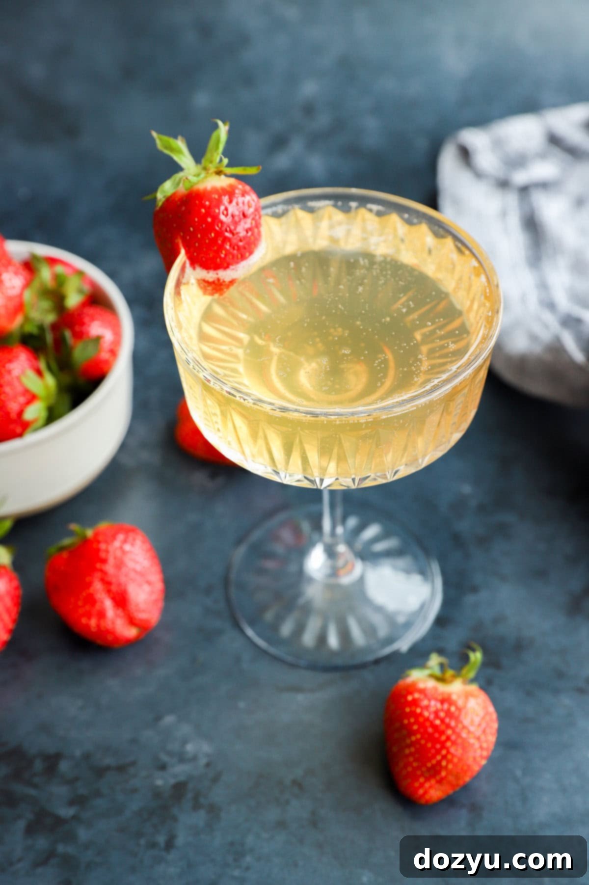 Strawberry Celebration Sparkle 9 fresh fruit in a bowl with sparkling wine cocktail