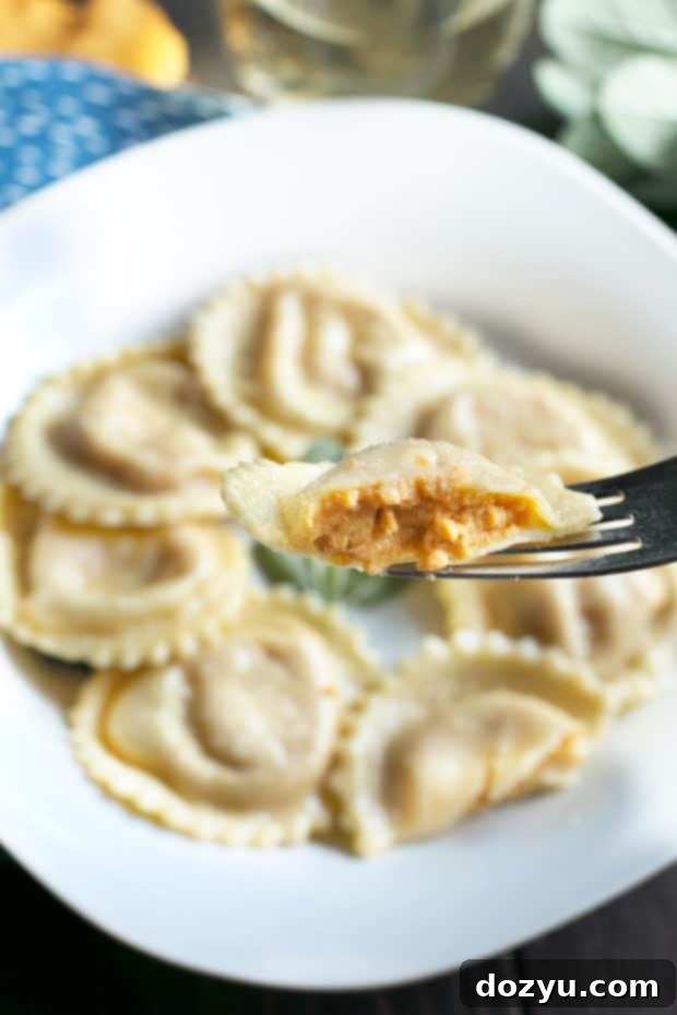 Pumpkin Ricotta Ravioli with Brown Butter Sage Sauce 5 The process of making pumpkin ricotta ravioli, showing filled pasta sheets before cutting.