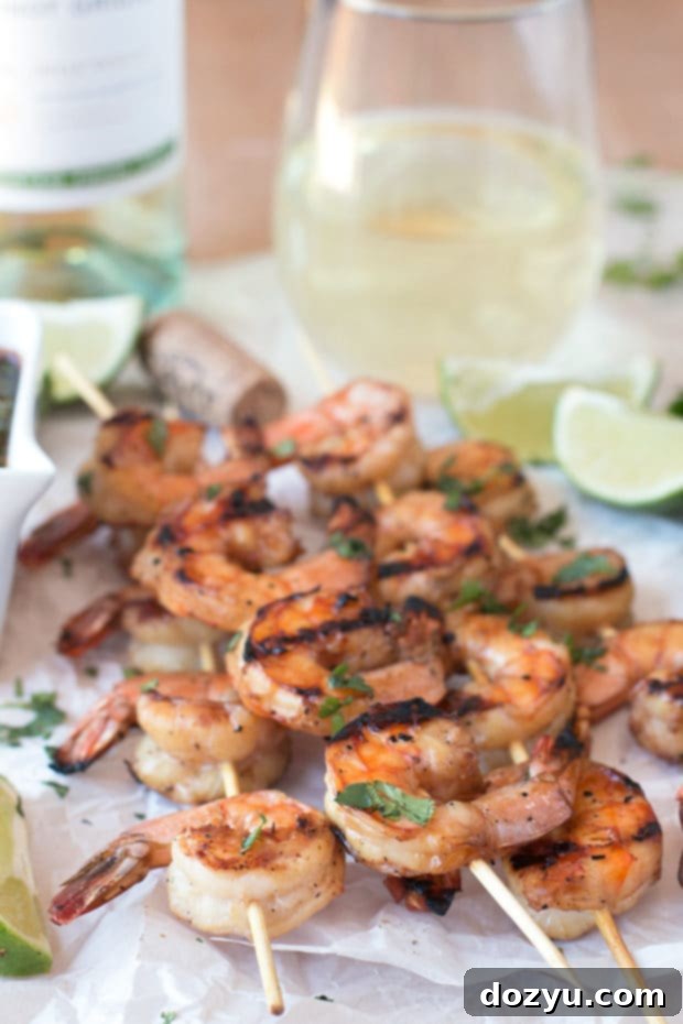Zesty Mango Garlic Shrimp Skewers with Spicy Cilantro Dip 7 The vibrant Spicy Cilantro Dipping Sauce in a small bowl, perfect for complementing the grilled mango garlic shrimp skewers. | cakenknife.com #21andup @CavitWines