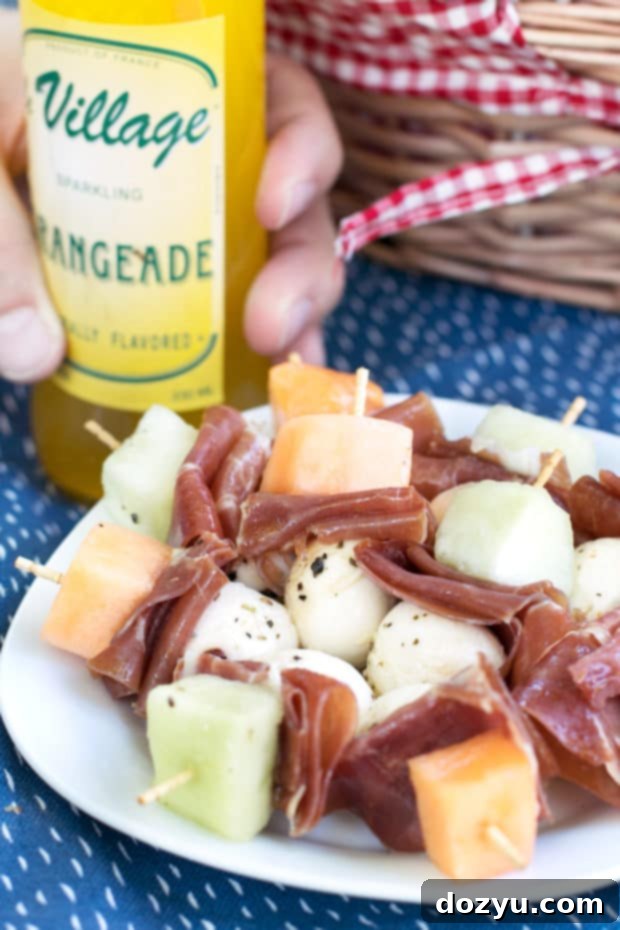 A beautifully packed picnic basket with Spicy Rotisserie Chicken Pressed Sandwiches