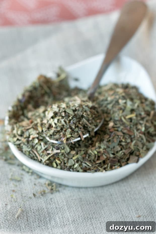 Carbonnades à la Flamande (Belgian Beer Beef Stew) | All the fresh ingredients, including beef, vegetables, herbs, and a bottle of Belgian beer, ready for the recipe.