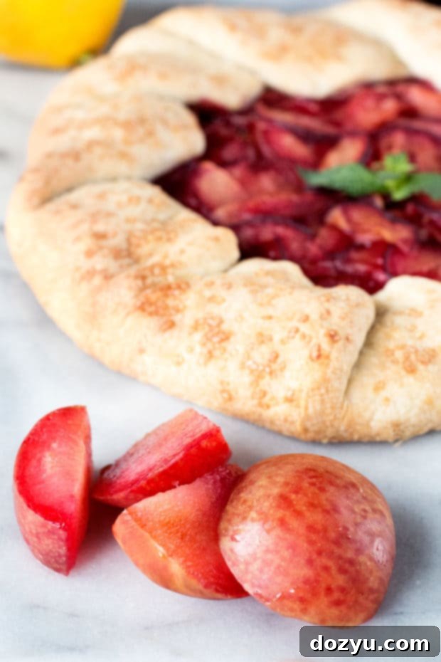 Preparing the pluot filling with lemon juice and sugars, highlighting the fresh fruit.