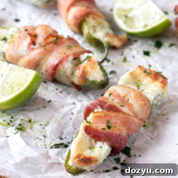 Goat Cheese Stuffed Bacon Wrapped Jalapeños recipe card image.