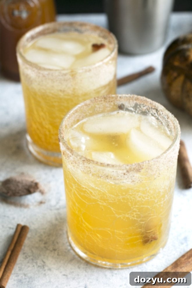 pumpkin spice cocktail with bourbon image in glasses
