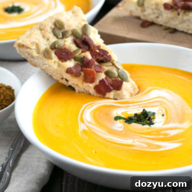 Golden Curried Butternut Squash Soup Paired with Smoky Bacon Pumpkin Seed Bread 11 Curried Roasted Butternut Squash Soup with Bacon Pumpkin Seed Bread | cakenknife.com #soup #fall #butternutsquash #thanksgiving