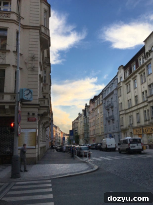 Charming street view in Copenhagen with colorful buildings and people