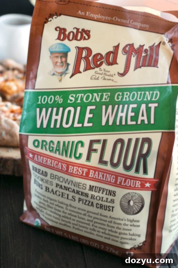 Whole Wheat Asiago Sweet Potato Galette, showcasing the dough being rolled out on a marble pastry board.