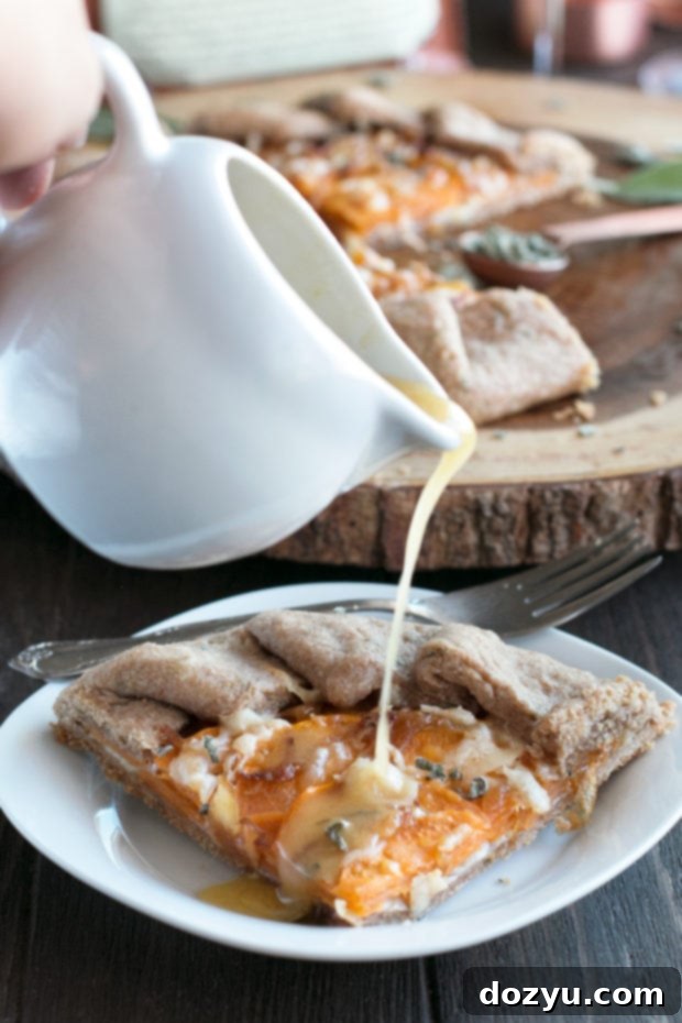 Whole Wheat Asiago Sweet Potato Galette, hot out of the oven, with a golden crust and bubbly filling.