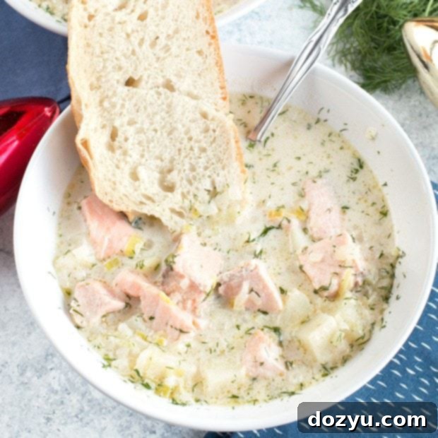 Hearty Salmon Chowder 12 Creamy Salmon Chowder, a comforting and flavorful soup, ready to be served. #salmonchowder #recipe #soup