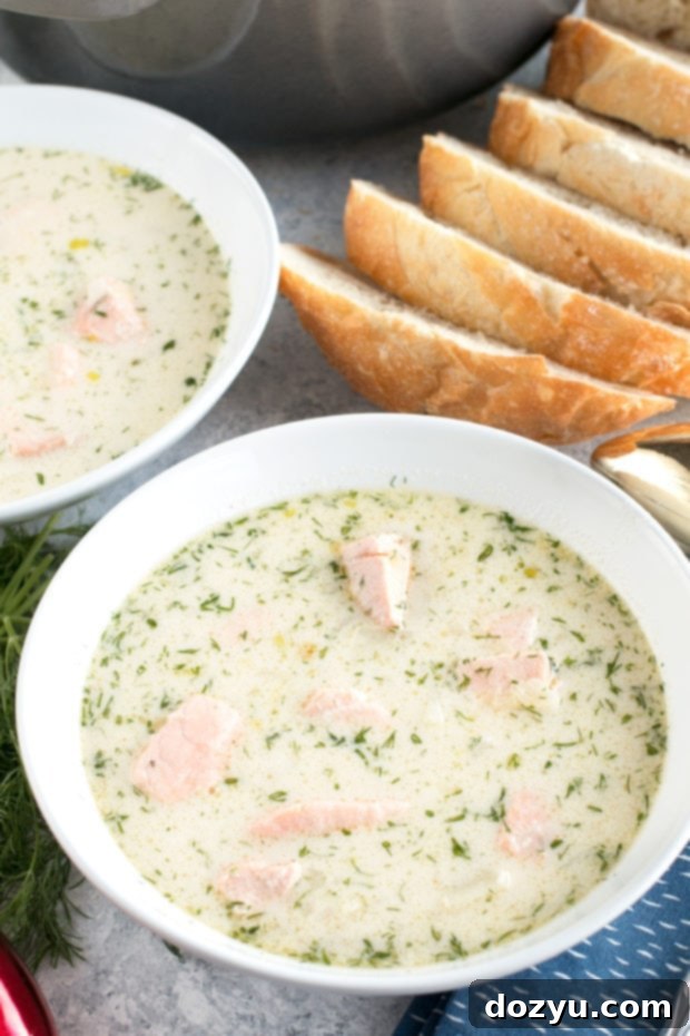 Delicious and creamy Salmon Chowder in a bowl, showcasing its rich texture and fresh ingredients. #chowder #salmon #seafood #soup