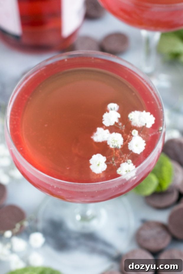 Two glasses of Sparkling Mint Rose Wine Cocktail ready for enjoyment.