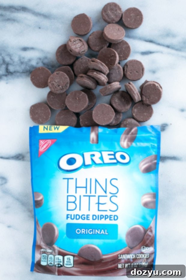 Close-up of delicious OREO Thins Bites with fudge dipping.
