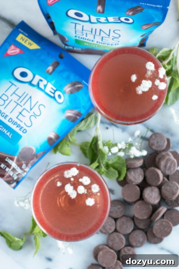 Sparkling Mint Rose Wine Cocktail served alongside OREO Thins Bites for a perfect snack.